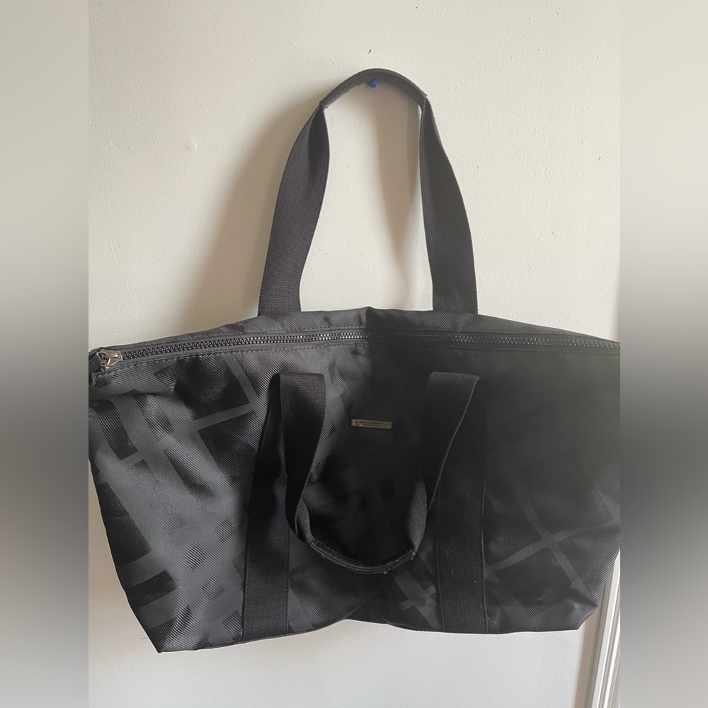 EUC: a black Burberry Fragrance duffle bag